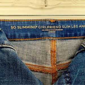Chico's Blue Denim Slim Leg Ankle Jeans with frayed hem.